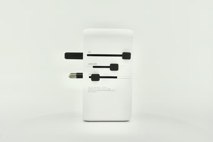 VoltArk travel adapter with switchable EU, US/AUS and UK plugs