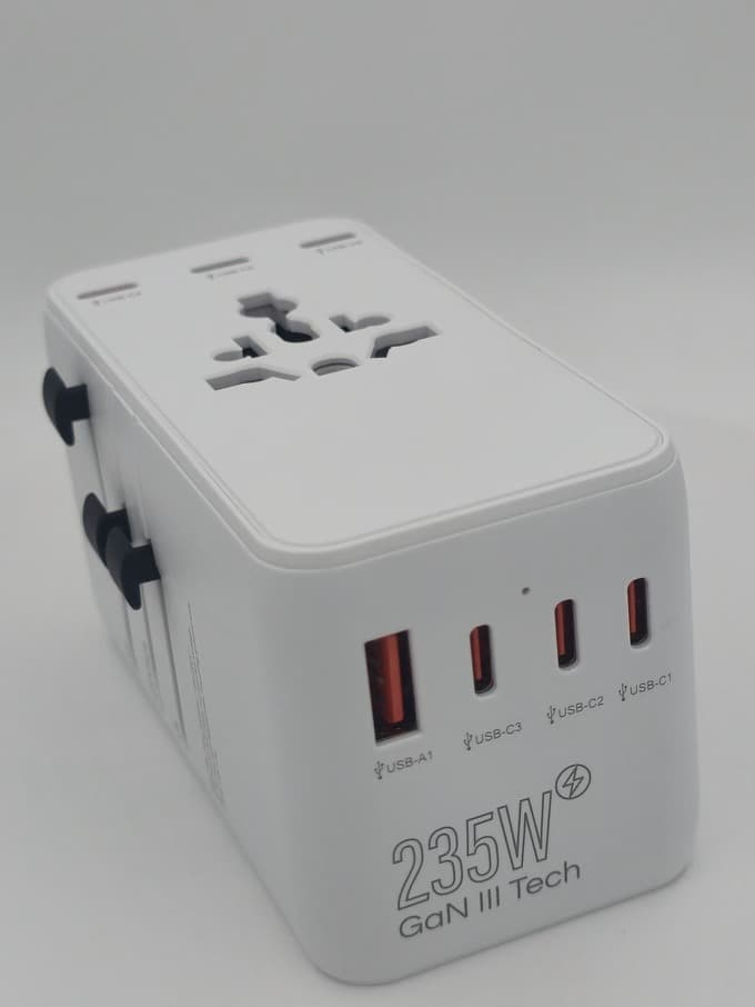 VoltArk 235W travel power hub, three-quarter view showing the universal AC outlet and USB-C ports